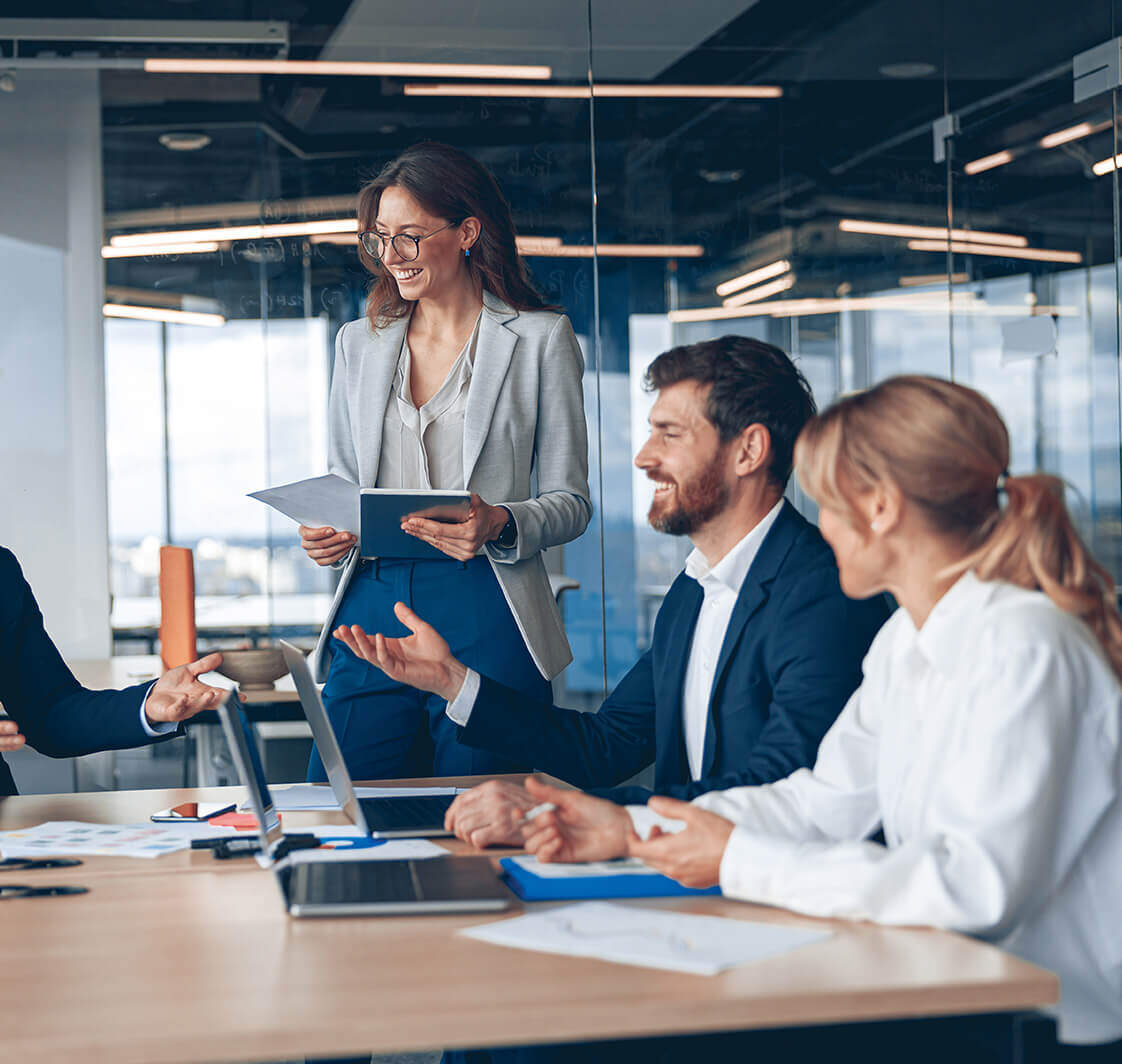 A group of business people partners during a set team meeting in the modern office.