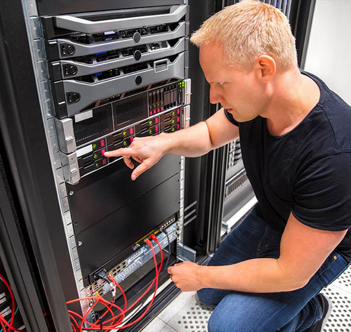 IT technician working on a server.