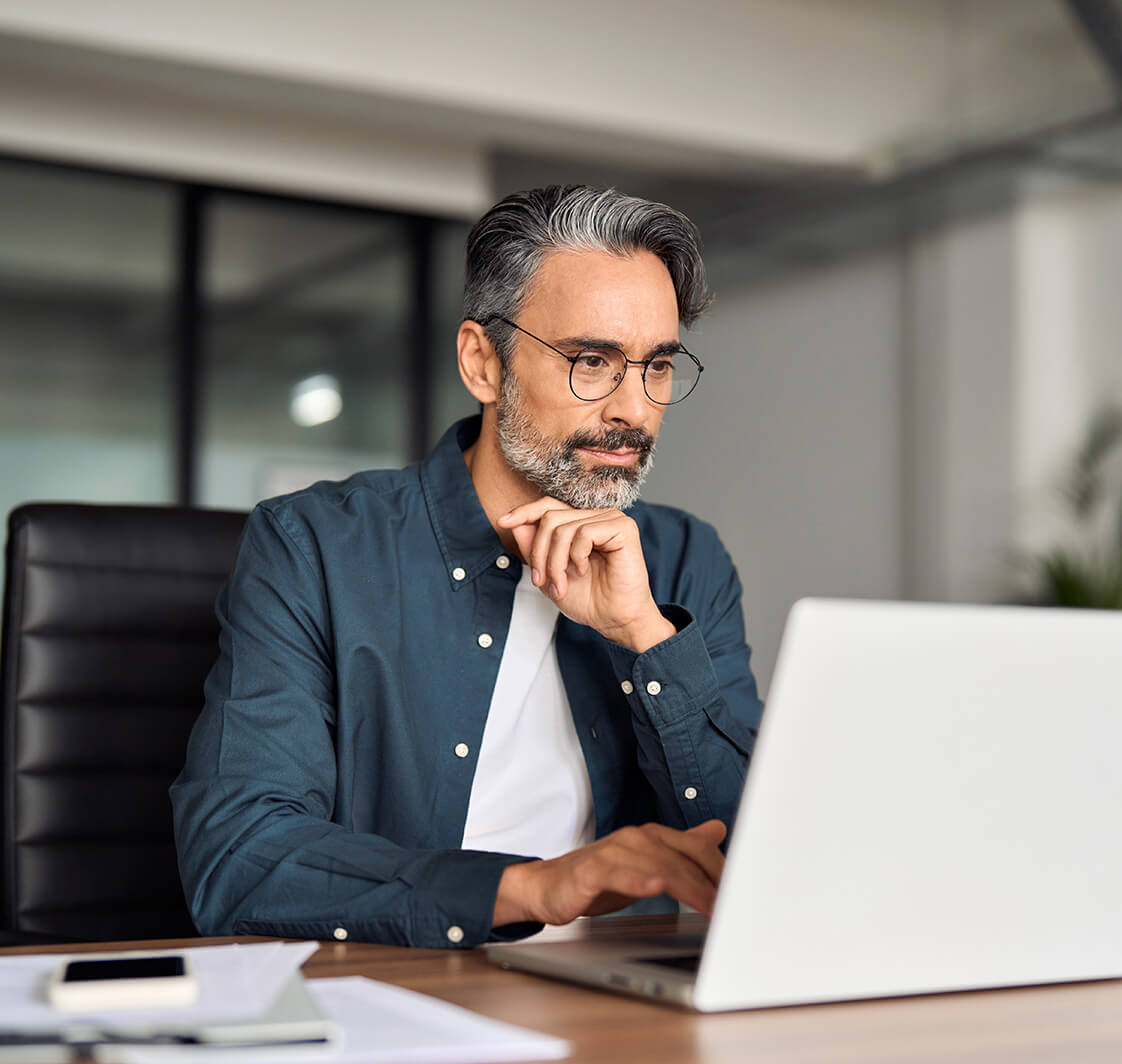 Man working on a laptop.