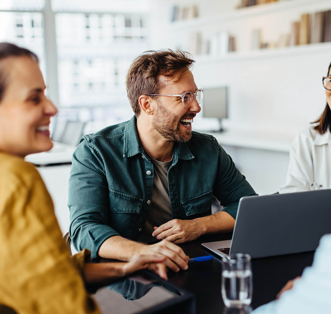 Diverse business people having a team meeting in an office.