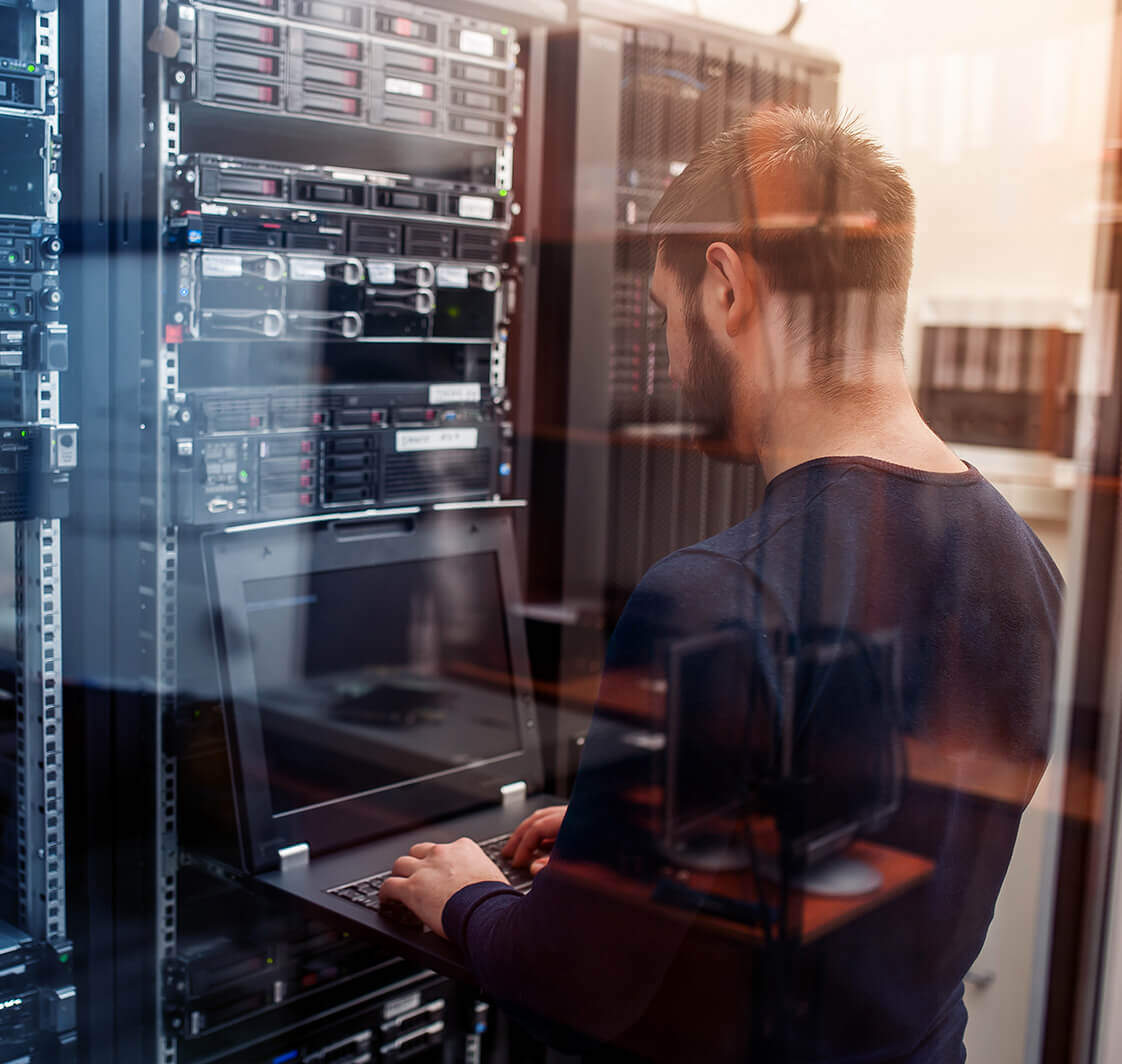 IT technician accessing a server terminal.