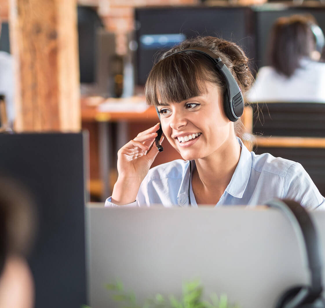 Call center worker accompanied by her team.