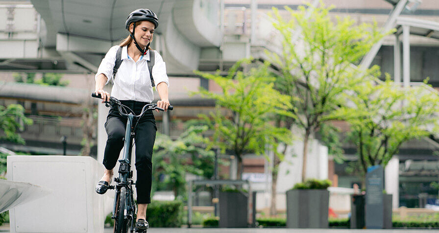 Person cycling to work